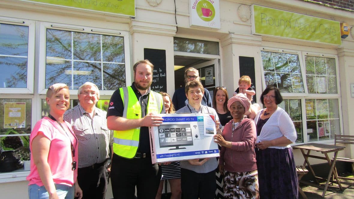 Nigel Staff Lillian Volunteer TV outside Group