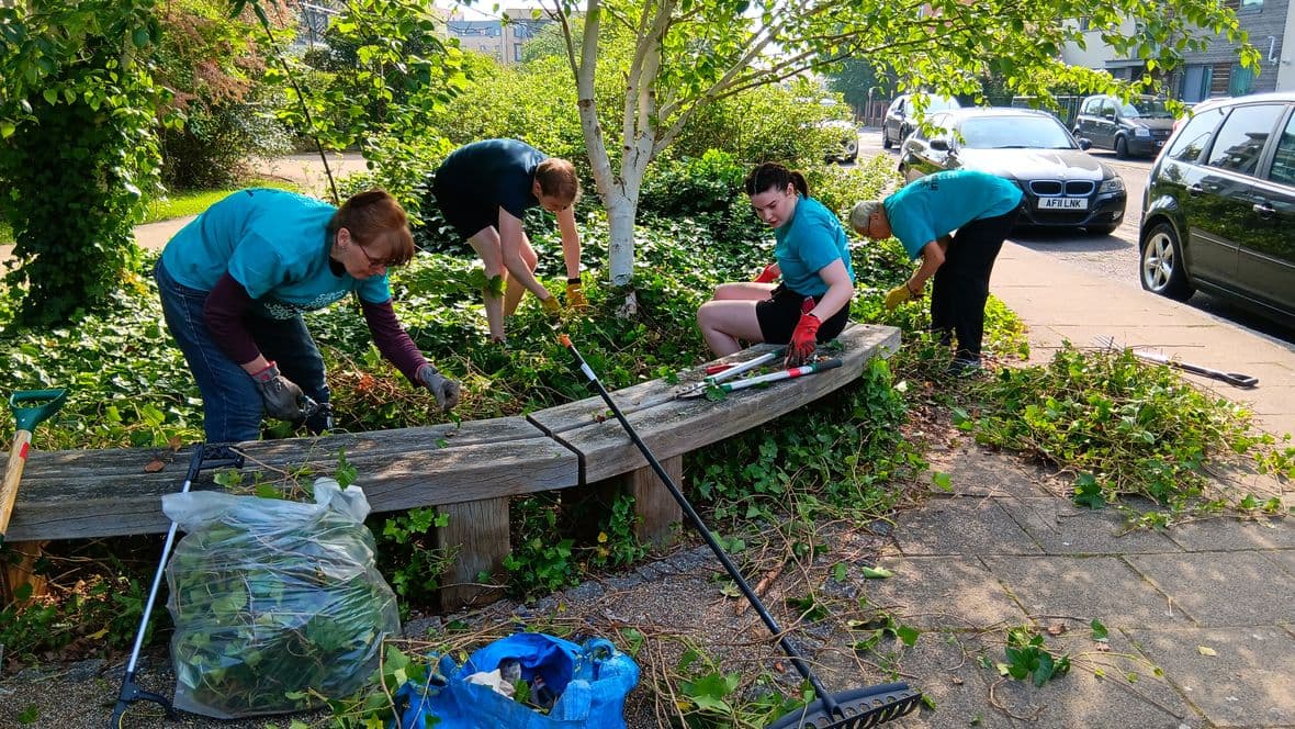 Team working on Saints in the City Day start May 24